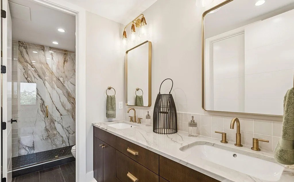 Luxury marble and brass bathroom in Park City home