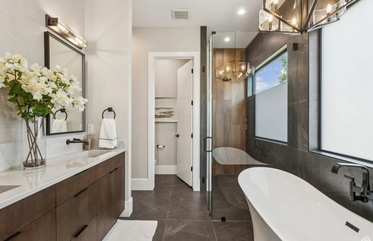 Luxury bathroom with freestanding tub and natural stone