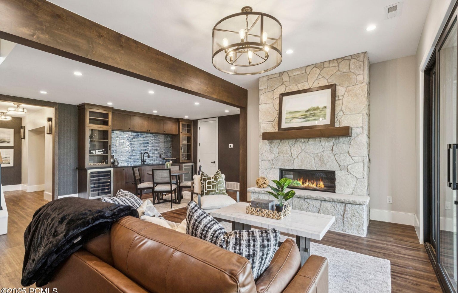 Completed living room remodel with custom finishes and natural light