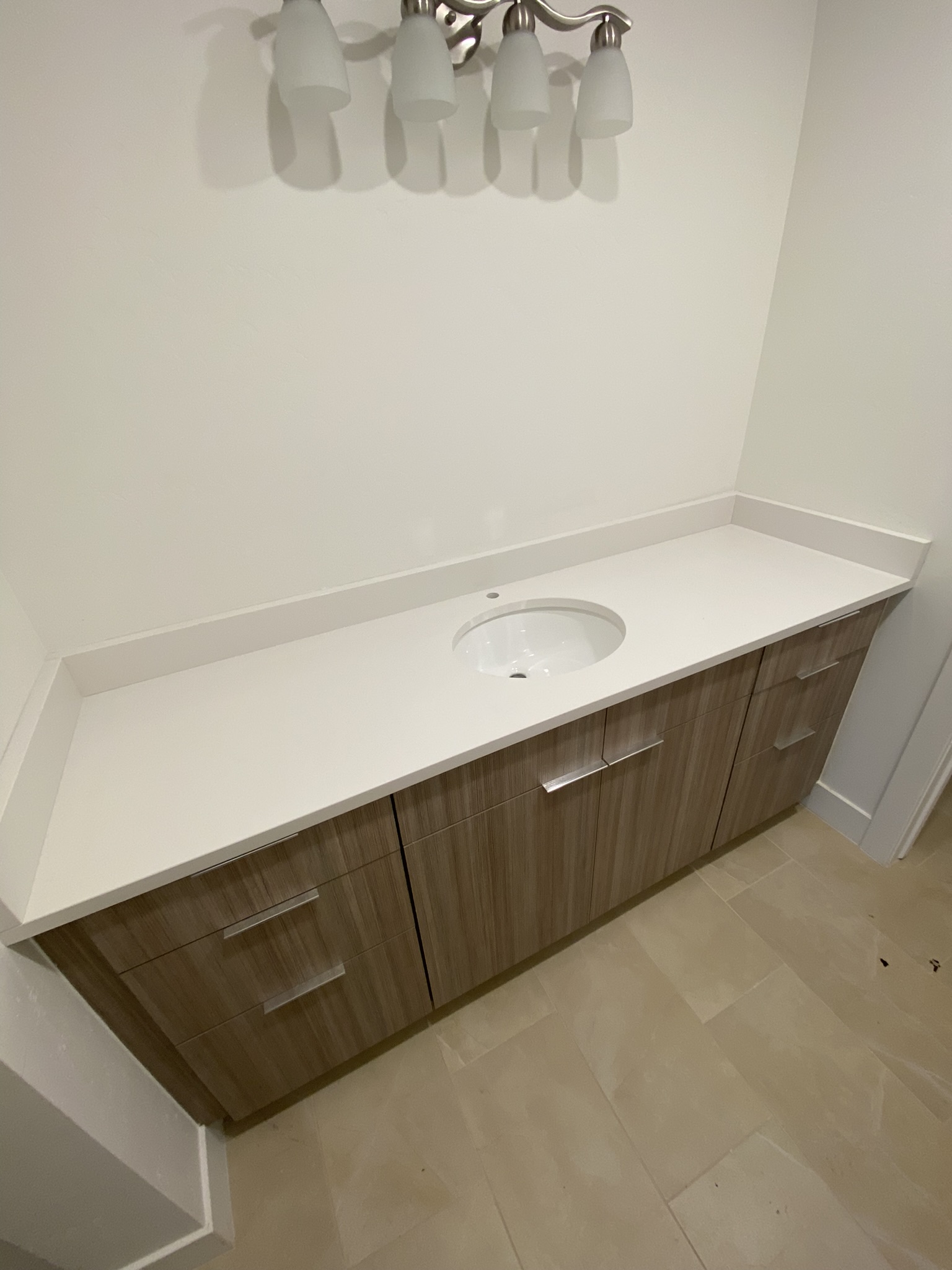 Vanity detail — white quartz countertop close-up