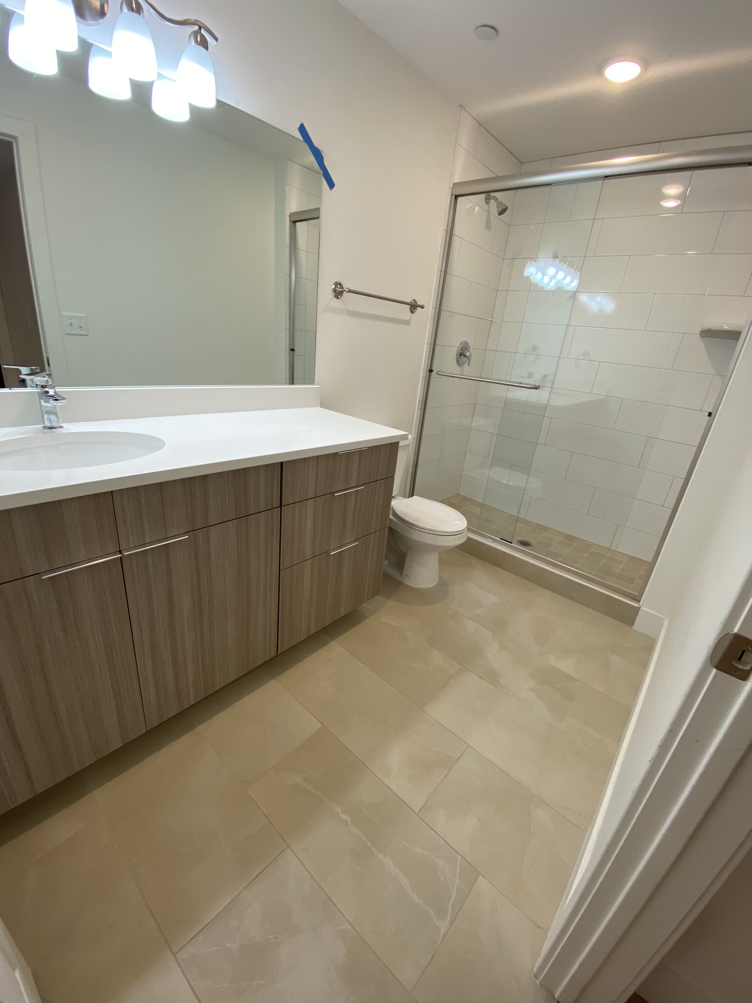 Primary bathroom alternate angle showing full layout